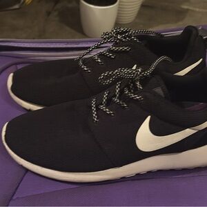 Nike Black Sneakers with White Swoosh